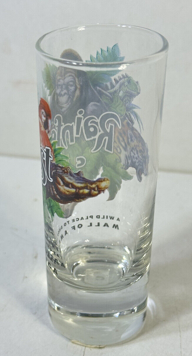 Lot of 2 Tall Souvenir Shot glasses Rainforest Cafe and North Shore Lighthouse