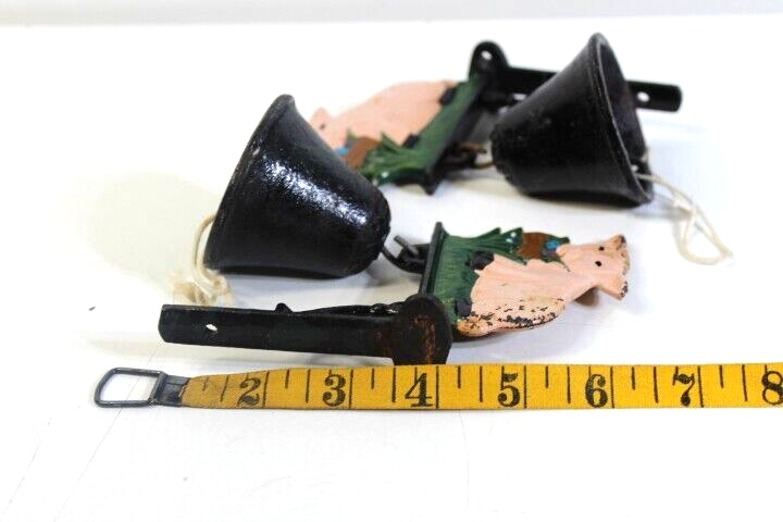 Set of 2 matching Cast Iron Pig design and wall hanging bells working