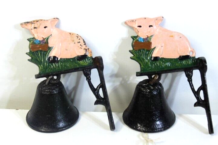 Set of 2 matching Cast Iron Pig design and wall hanging bells working