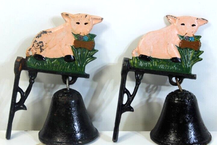 Set of 2 matching Cast Iron Pig design and wall hanging bells working